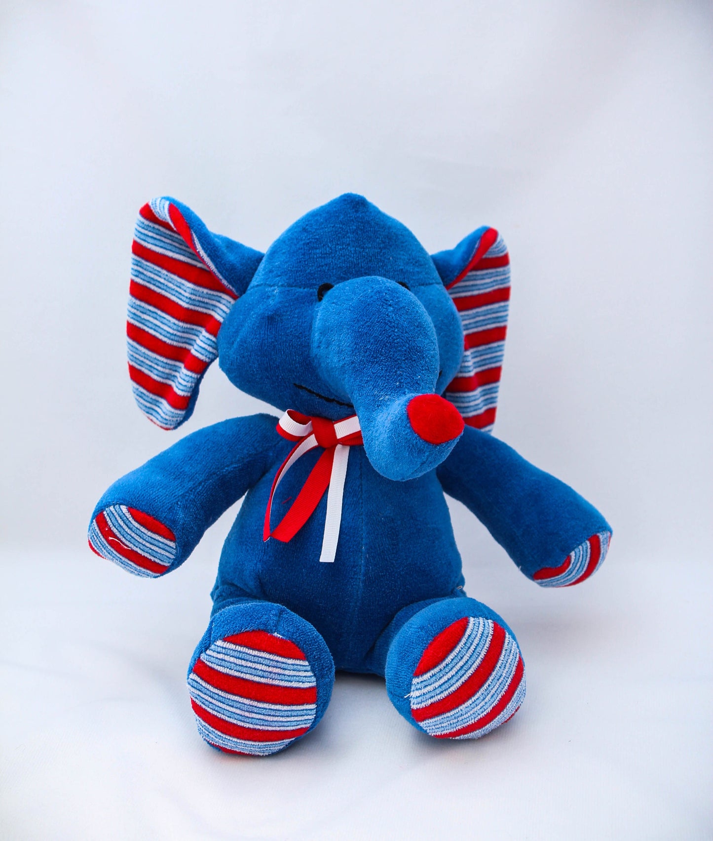 Keepsake Stuffed Elephant made out of your favorite baby or adult outfits or clothes